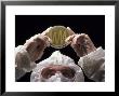 Microbiologist Examining Bacterial Culture On Petri Dish by David M. Dennis Limited Edition Print