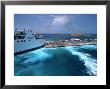 Ferry Docking, Los Island, Greece by Walter Bibikow Limited Edition Print