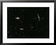The Leo Triplet, Also Known As The M66 Group, Is A Small Group Of Galaxies In The Constellation Leo by Stocktrek Images Limited Edition Print