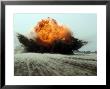 An Explosion Erupts From The Detonation Of A Weapons Cache by Stocktrek Images Limited Edition Pricing Art Print