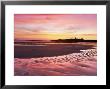 Embleton Bay At Sunrise, Low Tide, With Dunstanburgh Castle In Distance, Northumberland, England by Lee Frost Limited Edition Print