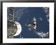 Space Shuttle Endeavour Backdropped By A Blue And White Earth by Stocktrek Images Limited Edition Print