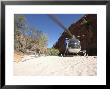 Helicopter On Sand At Bullo River Station, Near Kununurra, Northern Territory, Australia by Michael Gebicki Limited Edition Print