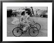 Women Riding Bicycles In Saigon by John Dominis Limited Edition Pricing Art Print