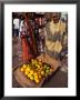 Women With Wheelbarrow Of Lemons At Local Market, Djibouti, Djibouti by Mason Florence Limited Edition Print