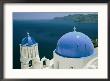 Elevated View Of The Aegean Sea From Atop A Church With Blue Domed Roofs by Todd Gipstein Limited Edition Print