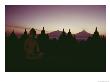 A Buddha Sits In The Silence Amid 1200-Year-Old Stupas At Borobudur by Dean Conger Limited Edition Print