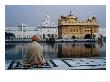 Sikh Man Meditating In Front Of The Golden Temple, Amritsar, India by Anthony Plummer Limited Edition Print