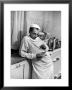 Dr. Ernest Ceriani In A State Of Exhaustion, Having A Cup Of Coffee In The Hospital Kitchen At 2 Am by W. Eugene Smith Limited Edition Print