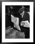 News Vendor Sorting Through Bundles Of The Jewish Daily Forward by Hansel Mieth Limited Edition Print