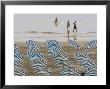 Umbrellas On The Beach, Family In The Sea, Jesolo, Venetian Lagoon, Veneto, Italy by James Emmerson Limited Edition Print