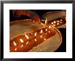 Pilgrims Pour Melting Butter From Their Lamps Into The Yak Butter Lamps In The Monastery by Don Smith Limited Edition Print