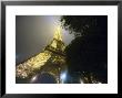 Close-Up Of Eiffel Tower Illuminated At Night, Paris, France by Jim Zuckerman Limited Edition Print