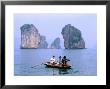 People Fishing In Small Boat With Karsts In Background, Ha Long, Bac Giang, Vietnam by Christopher Groenhout Limited Edition Print