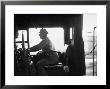 Engineer Aboard The 20Th Century Limited Riding In Cab With His Hand On The Engine Brake by Alfred Eisenstaedt Limited Edition Print