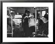 Lady Searching For 2 Cents For Her Bus Fair by Nina Leen Limited Edition Print