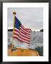Flag Waves On The Stern Of A Maine Made Hampton Yacht, Kennebec River, Bath, Maine, Usa by Heather Perry Limited Edition Print