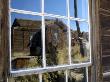 Ghost Town Building Reflected In Window Of Abandoned Structure, Bodie State Historic Park by Dennis Kirkland Limited Edition Print