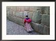 Indian Woman On Cobblestone Street Lined With Inca Stone Walls, Cuzco, Peru by Keren Su Limited Edition Print