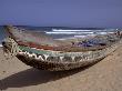 Keta Fishing Canoe On Keta Beach, Ghana by Bob Burch Limited Edition Pricing Art Print