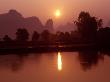 Orange Sunset Reflected On Water, China by Inga Spence Limited Edition Print