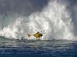 Helicopter Hovers In Front Of Surf Crashing On Mauis Northshore At Peahi, Hawaii by David B. Fleetham Limited Edition Print