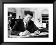 President John F. Kennedy Working At His Desk In The Oval Office Of The White House by Alfred Eisenstaedt Limited Edition Print