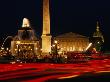 Illuminated Ancient Egyptian Obelisk And Fountain In Place De La Concorde, Paris, France by Bill Wassman Limited Edition Print