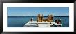 Rear View Of Two Adirondack Chairs On A Dock, Minnesota, Usa by Panoramic Images Limited Edition Print