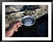 Hiker Getting A Cool Cup Of Water by Sam Abell Limited Edition Pricing Art Print