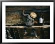 A Chinese Woman Scrubs The Outside Of A Junk by Joe Scherschel Limited Edition Print