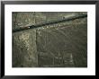 The Pan-American Highway Cuts Through The Nazca Lines Geoglyphs by Joel Sartore Limited Edition Print