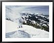 A Snowboarder Makes His Way Downhill Leaving A Puff Of Airborne Snow Behind Him by Paul Chesley Limited Edition Pricing Art Print