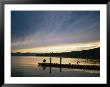 A Fisherman At Dawn Tries His Luck From The End Of A Pier by Michael S. Lewis Limited Edition Print