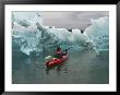 A Kayak Paddler Passes Sculpted Icebergs In Tracy Arm Fjord by Ralph Lee Hopkins Limited Edition Print