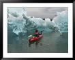 A Kayak Paddler Passes Sculpted Icebergs In Tracy Arm Fjord by Ralph Lee Hopkins Limited Edition Print