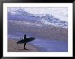 Surfer On The Malibu Shore, Los Angeles, California, Usa by Ray Laskowitz Limited Edition Print