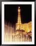 Paris Hotel And Casino's Eiffel Tower With The Bellagio Water Fountain Show, Las Vegas, Nevada, Usa by Brent Bergherm Limited Edition Print