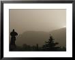 Silhouetted Statue Of Damo At The Entrance To Shaolin by Eightfish Limited Edition Pricing Art Print