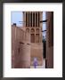 Man Walking In Lanes Of Bastikia Quarter, Dubai, United Arab Emirates by Phil Weymouth Limited Edition Pricing Art Print