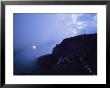 A Cross Stands On A Fog-Shrouded Hill At Sunrise by Raul Touzon Limited Edition Print