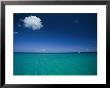 A Sailboat Plies A Clear Blue Sea Under Sky With A Single Cloud by Steve Winter Limited Edition Print