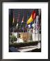 Flags Outside The Rockefeller Center, New York City, New York, Usa by Walter Rawlings Limited Edition Print