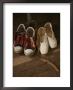 A Pair Of Ballet Toe Shoes Rest Next To A Pair Of Tennis Shoes by Jodi Cobb Limited Edition Print
