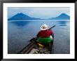 Man On Canoe In Lake Atitlan, Volcanoes Of Toliman And San Pedro Pana Behind, Guatemala by Keren Su Limited Edition Print