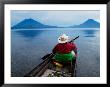 Man On Canoe In Lake Atitlan, Volcanoes Of Toliman And San Pedro Pana Behind, Guatemala by Keren Su Limited Edition Print