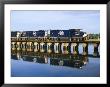 An Early Freight Train Crosses The Trestle Over The Matanzas River by Stephen St. John Limited Edition Print