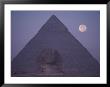 A View Of The Great Sphinx With A Full Moon And The Great Pyramid In The Background by Bill Ellzey Limited Edition Print