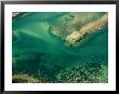 Aerial View Of Coast, Water, And Shifting Sediments Off Of Kenya by Bobby Haas Limited Edition Print