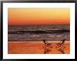 Silhouette Of Two Chairs On The Beach by Mitch Diamond Limited Edition Print